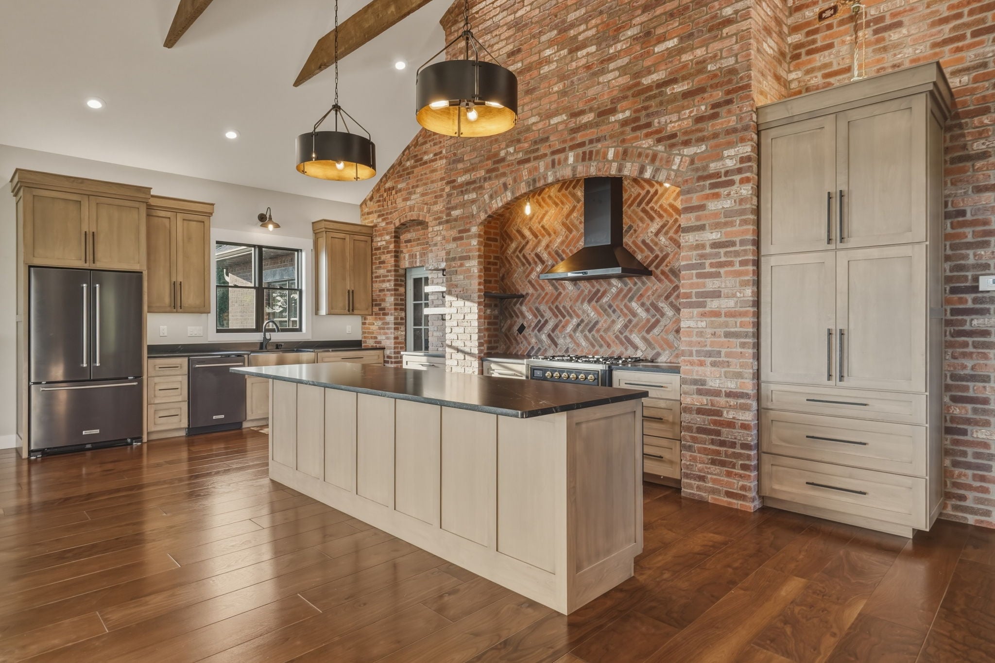 Kitchen island and herringbone hood