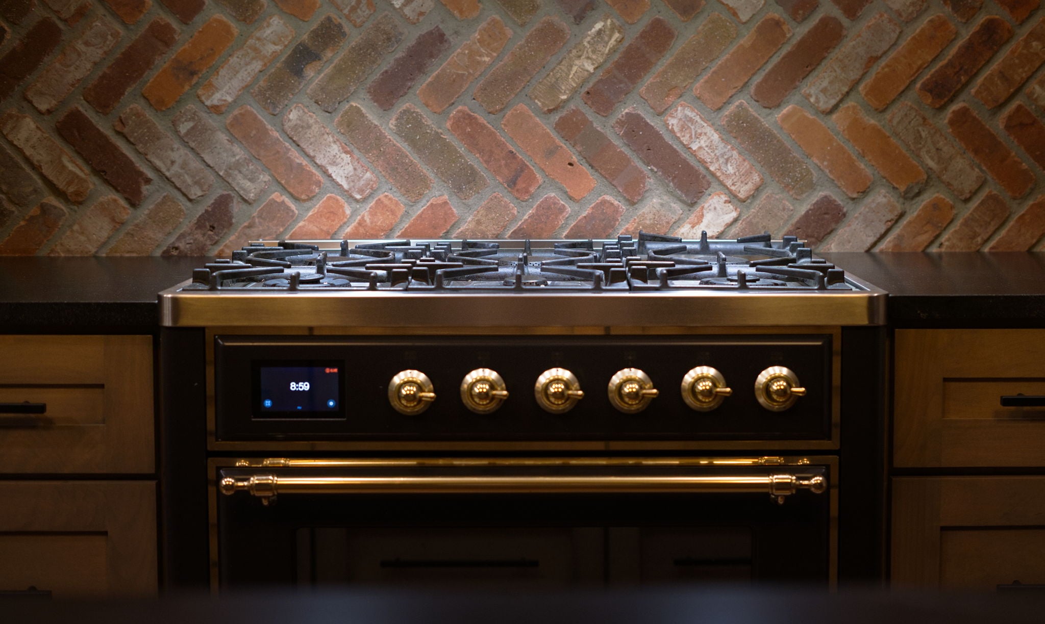 Kitchen range hood detail, lit